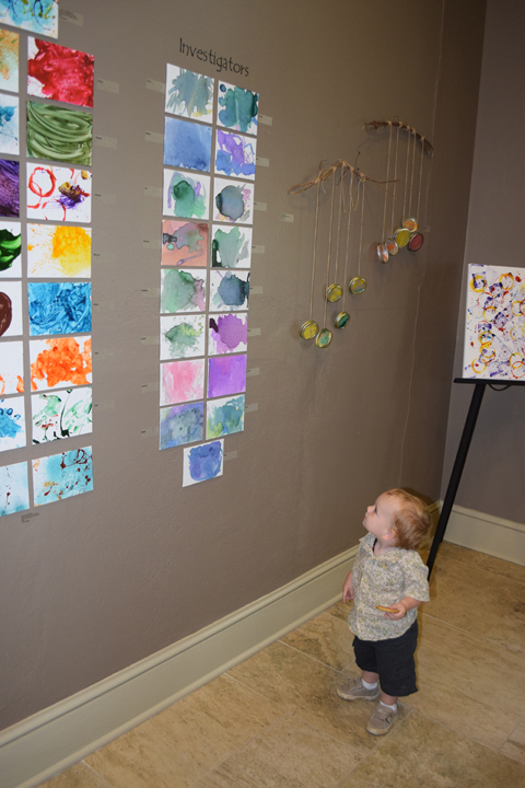 toddler looking at art