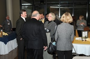 Attendees mingling before beginning of event