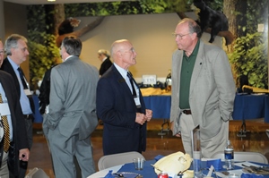 Senator Rusty Crowe talks with an attendee at the event
