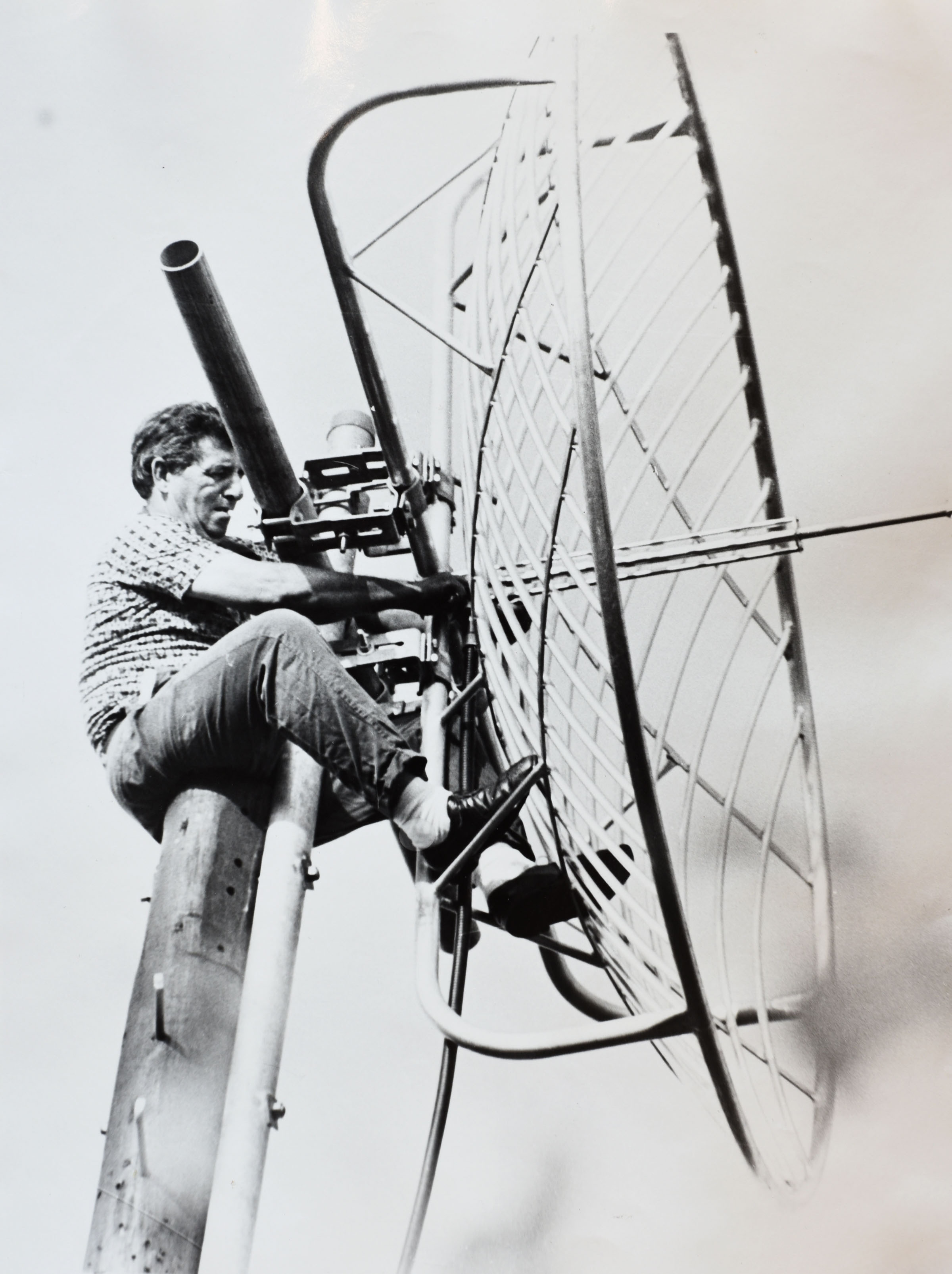 Dick Ellis could often be seen climbing the
antenna pole to install or repair equipment.