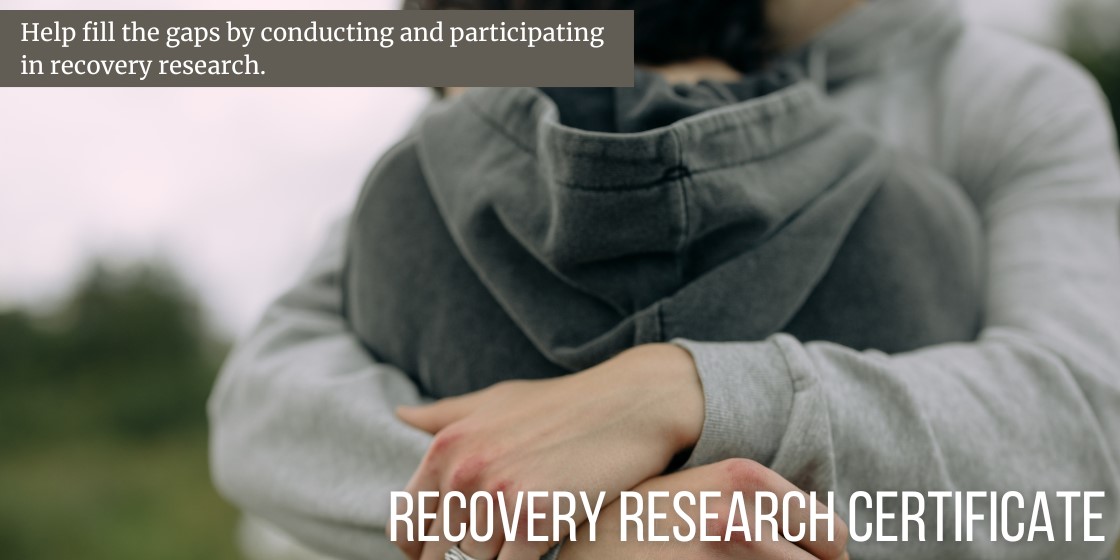 recovery research certificate - two individuals hugging in gray sweatshirts