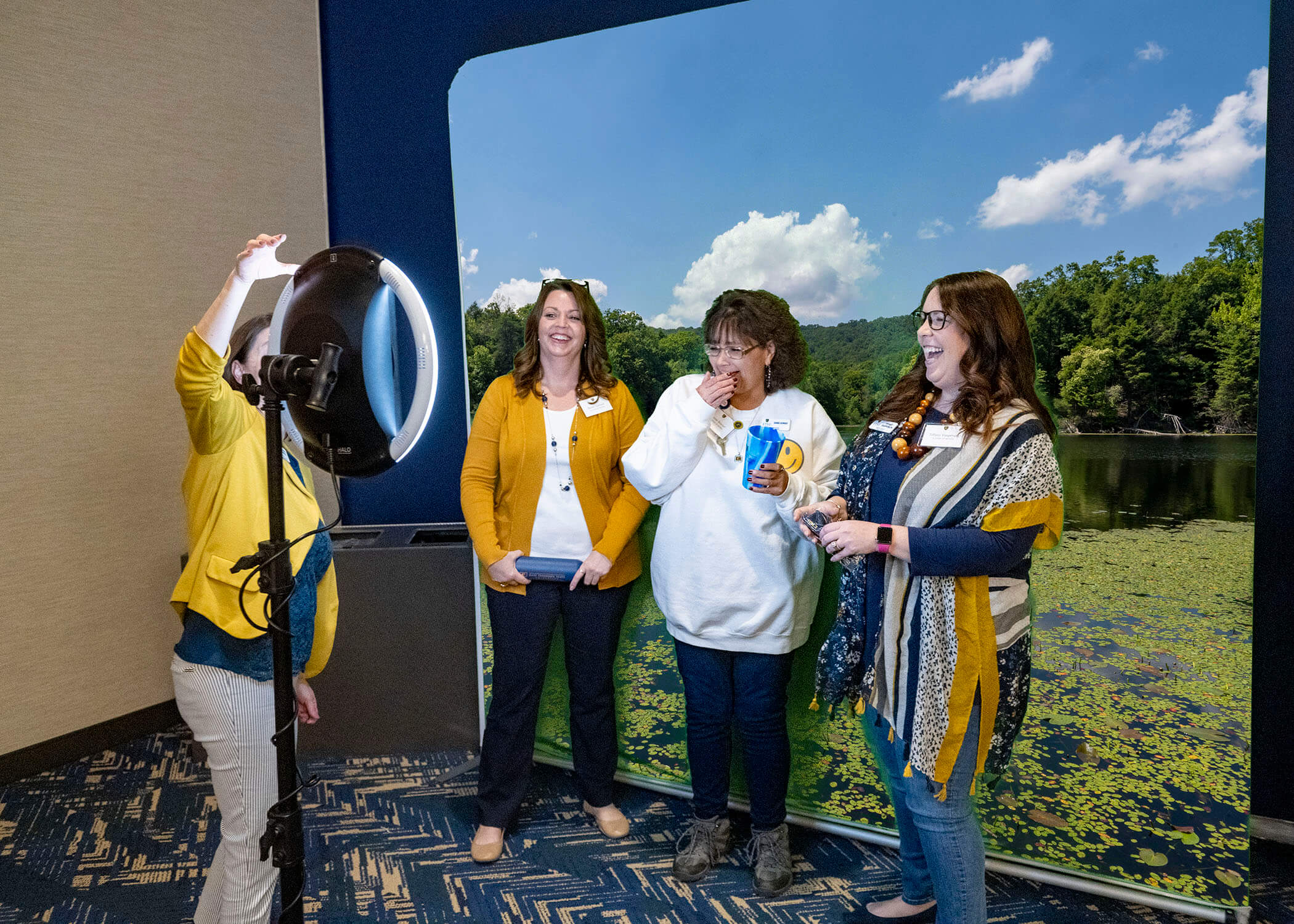 ETSU employees at the Service Awards pose in the selfie booth.