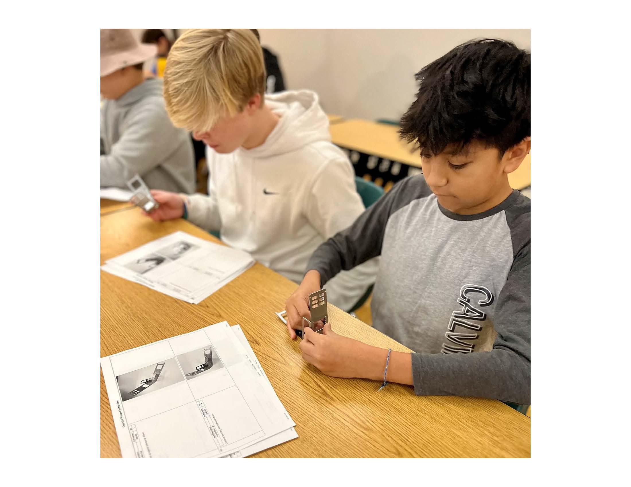 Hands-on activity with model cabs, led by Crenlo's manufacturing and engineering team. 2023-2024 program