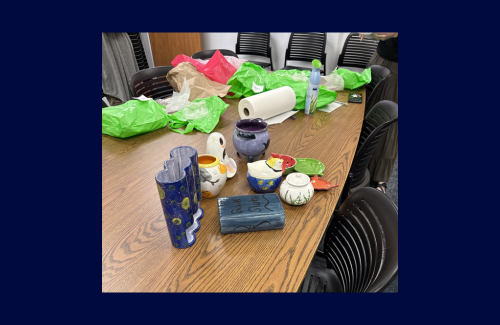 A group of Counseling Center staff members go "Into the Fire", making pottery together after work.