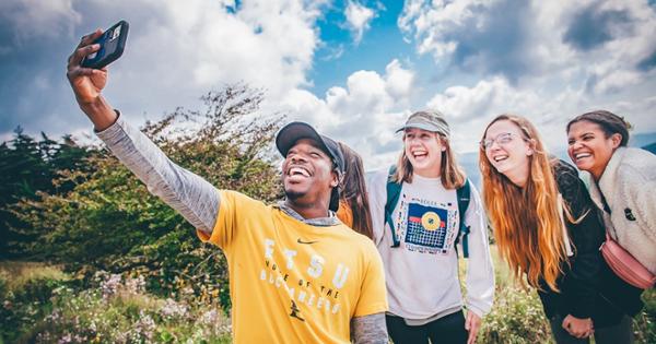 Students taking selfie on top of Roan Mountain
