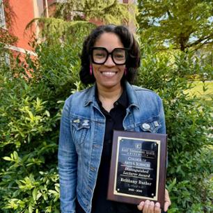 Photo of Brittany Butler with award