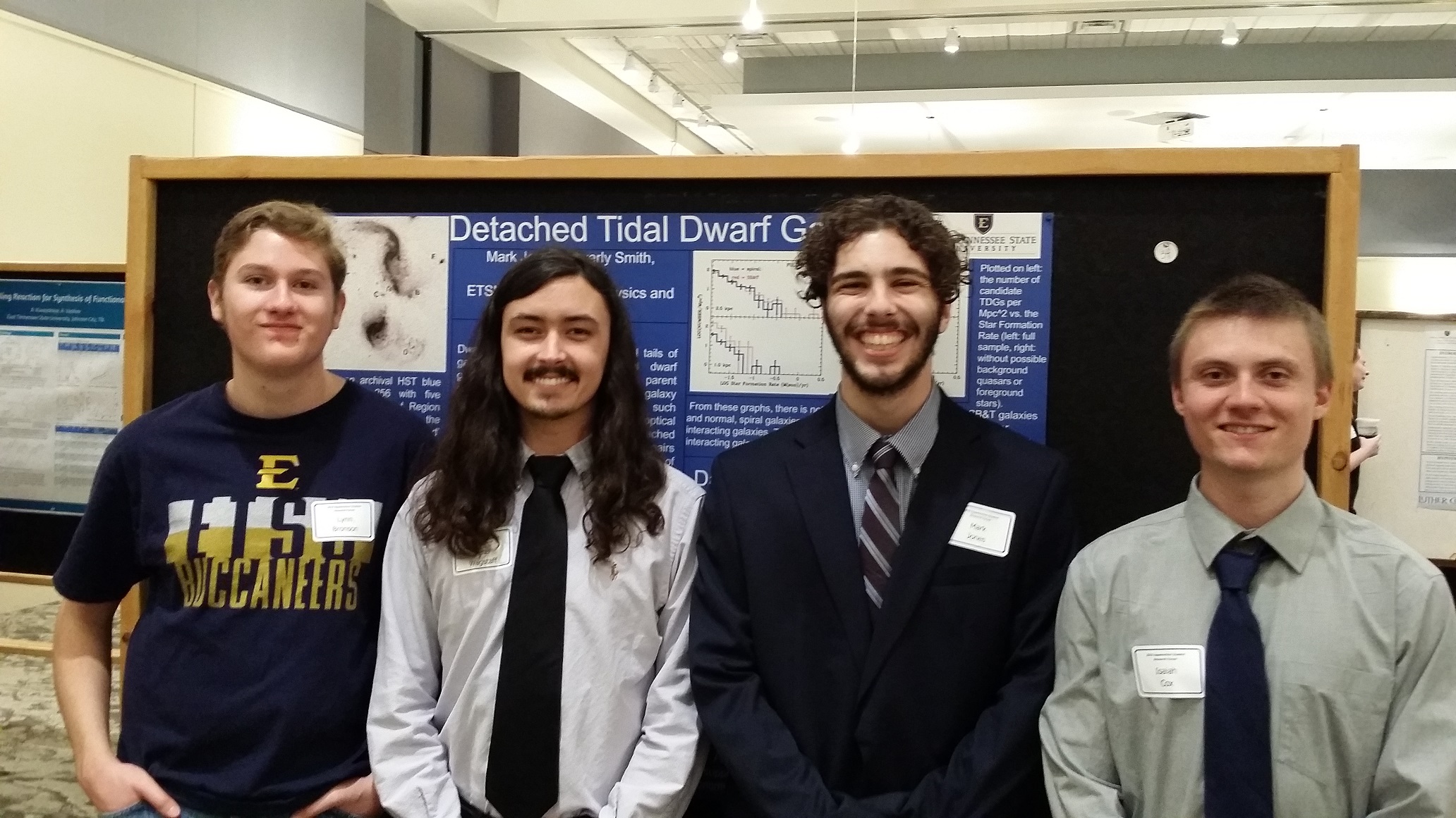 Photo for Four Physics majors presented posters
