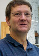 Photo of Dean Isham Associate Professor