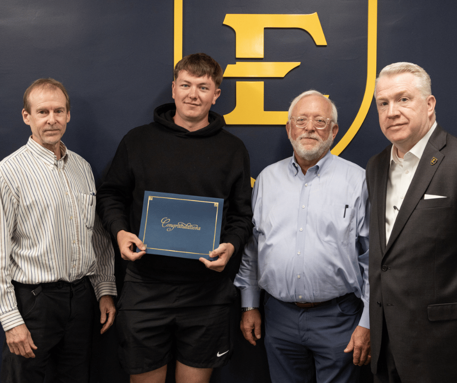 From left: Bill Trainor, CBAT student Joshua Pritchett, Jeff Anderson with Stifel, and Kevin Kilgore