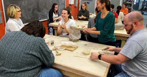 Dr. Rebecca Milner and clinical mental health students engage in experiential learning about creative therapy techniques in the ETSU clay studio.