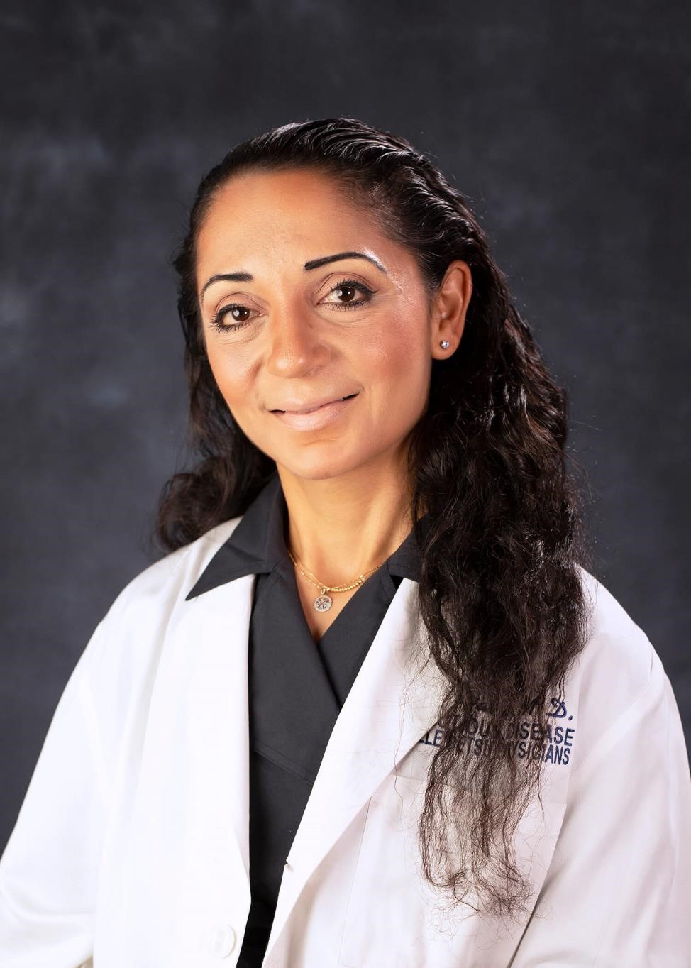 Photo of Dima Youssef, MD Associate Professor