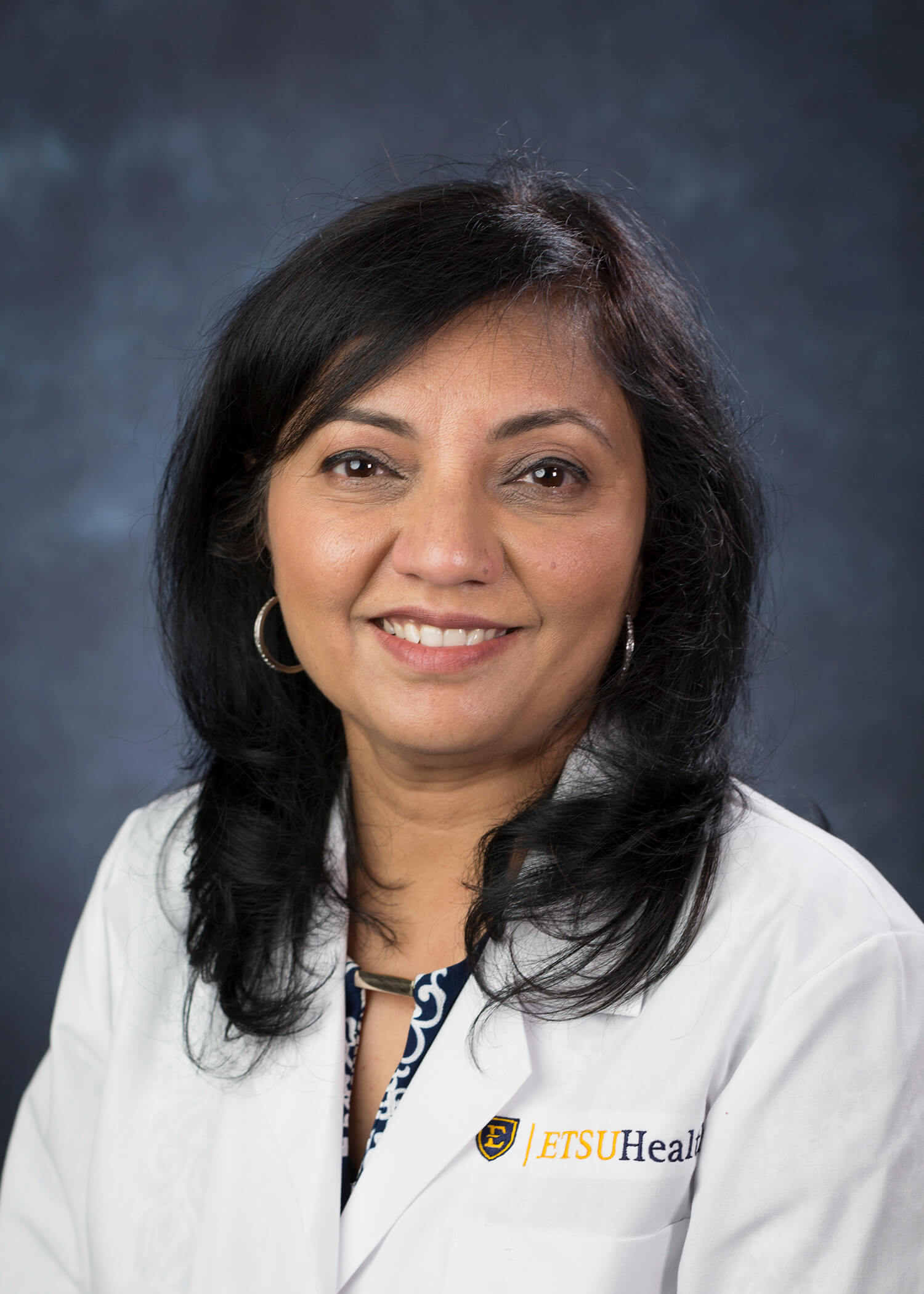 Photo of Rupal Shah, MD, FACP 
Division Chief,
Associate Professor
