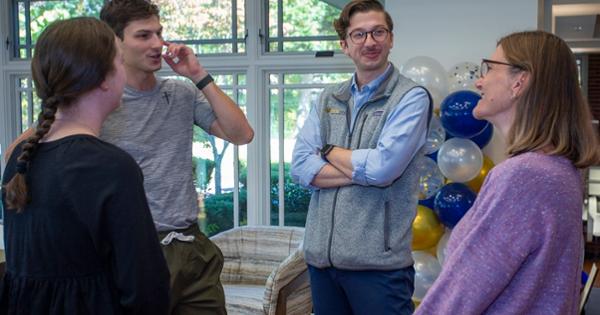 Photo of dean and students