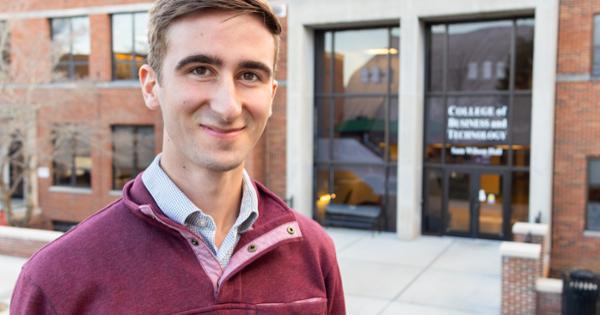 ETSU student Timothy Preshong standing outside Sam Wilson Hall