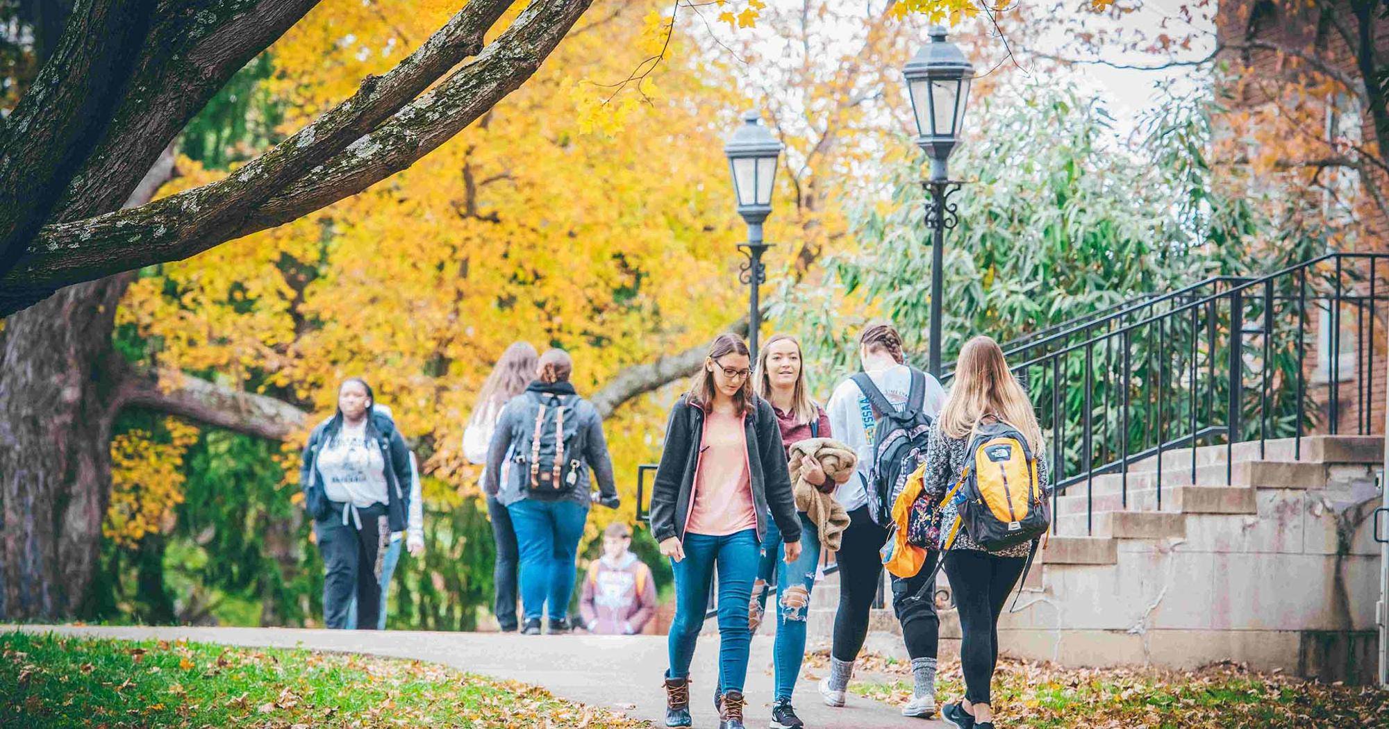 Students walk ETSU's main campus surrounded my fall color.