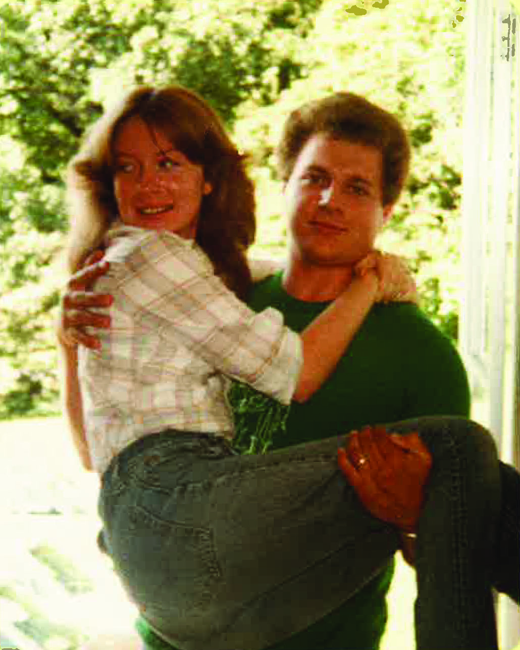 Col. Michael Connolly holds Vickie Connolly.