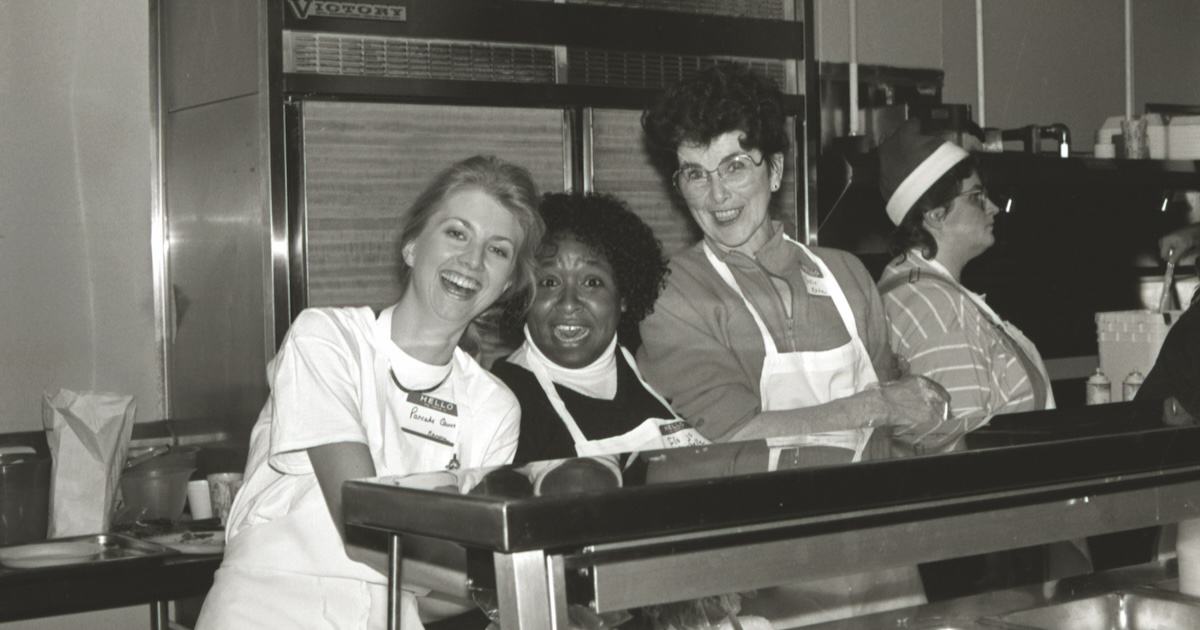 ETSU staff and faculty serve in the Dining Hall line at an ETSU Pancake Breakfast.