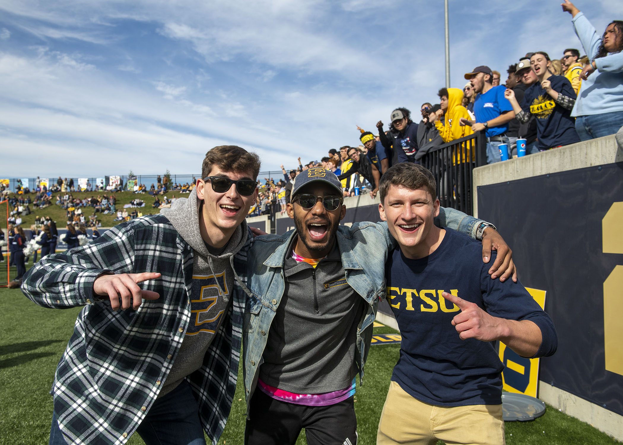 Students in Football Stadium