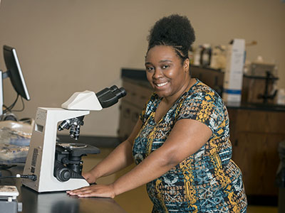 Cara Carter in a Gatton College of Pharmacy lab