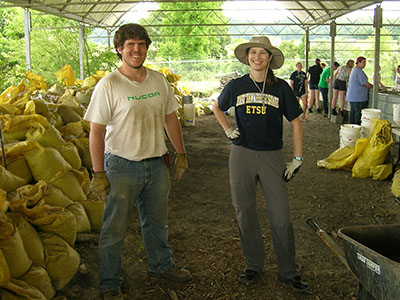 Pictured in the field at the Gray Fossil Site are Evan Doughty and Lauren Lyon, the graduates of ETSU’s master’s degree program in paleontology who coauthored the article describing the peccary discovery in PeerJ. (Photo contributed by Dr. Chris Widga)