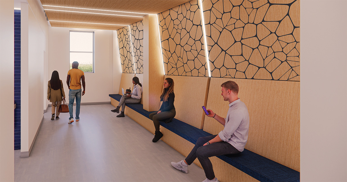 Rendering of a corridor in the Brown Hall renovation at ETSU featuring a long built-in bench with blue cushions and a geometric wood accent wall with integrated linear lighting. Students sit along the bench using phones and laptops while others walk toward a window at the end of the hall.