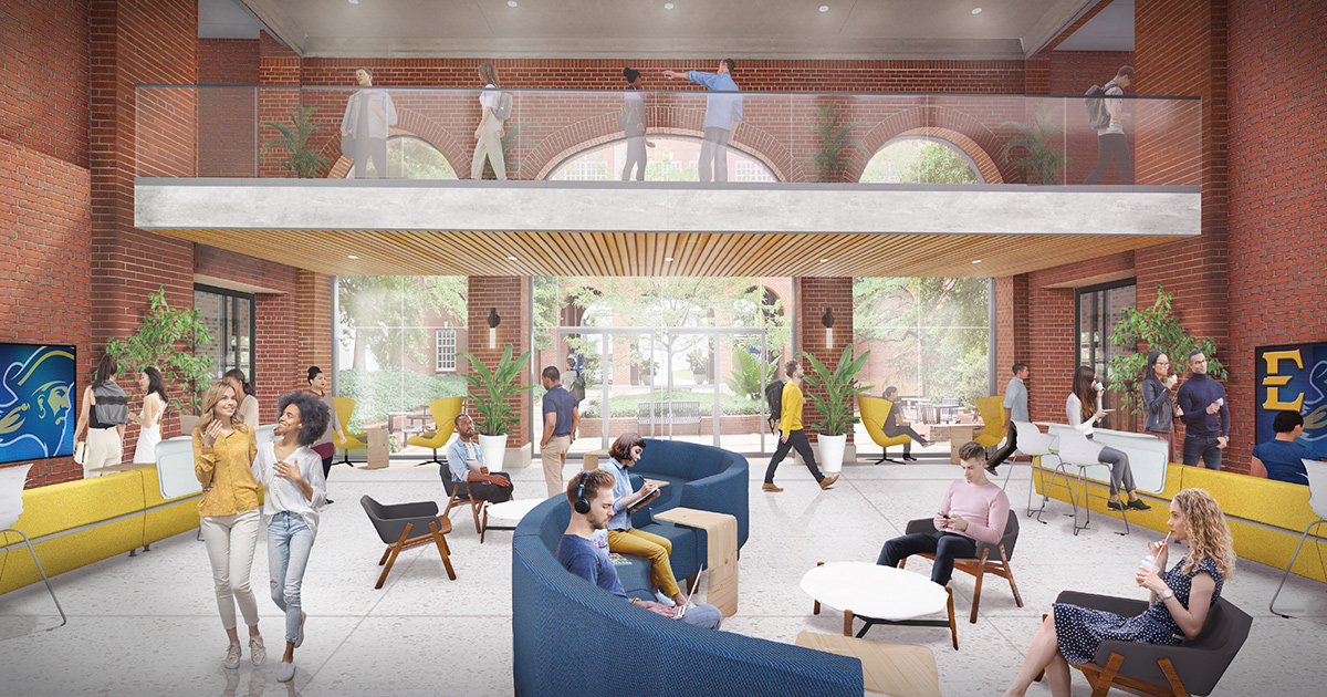 Rendering of the main interior commons of the Brown Hall renovation at ETSU with exposed brick, a mezzanine level, and large glass doors opening to campus. Students sit in yellow and blue lounge seating, talk in small groups, and move through the light-filled space.