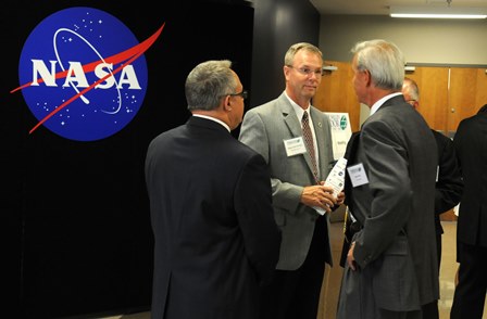 Kingsport Mayor John Clark speaks with Washington County Mayor Dan Eldridge by the NASA exhibit 