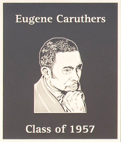 A plaque featuring the engraved portrait of Eugene Caruthers