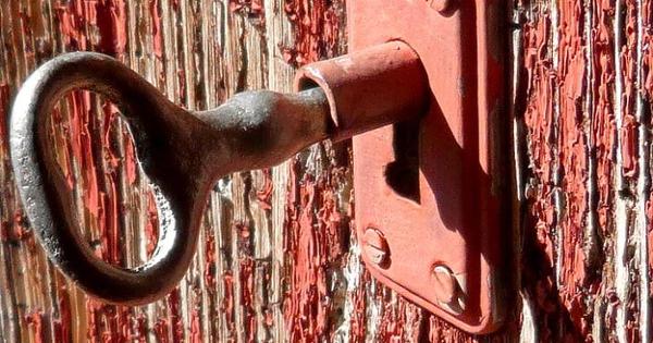key in lock of wooden door